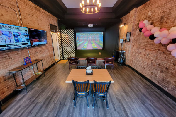 Caddy Shack Golf Pub | location interior backroom with golf simulator | Decatur IL